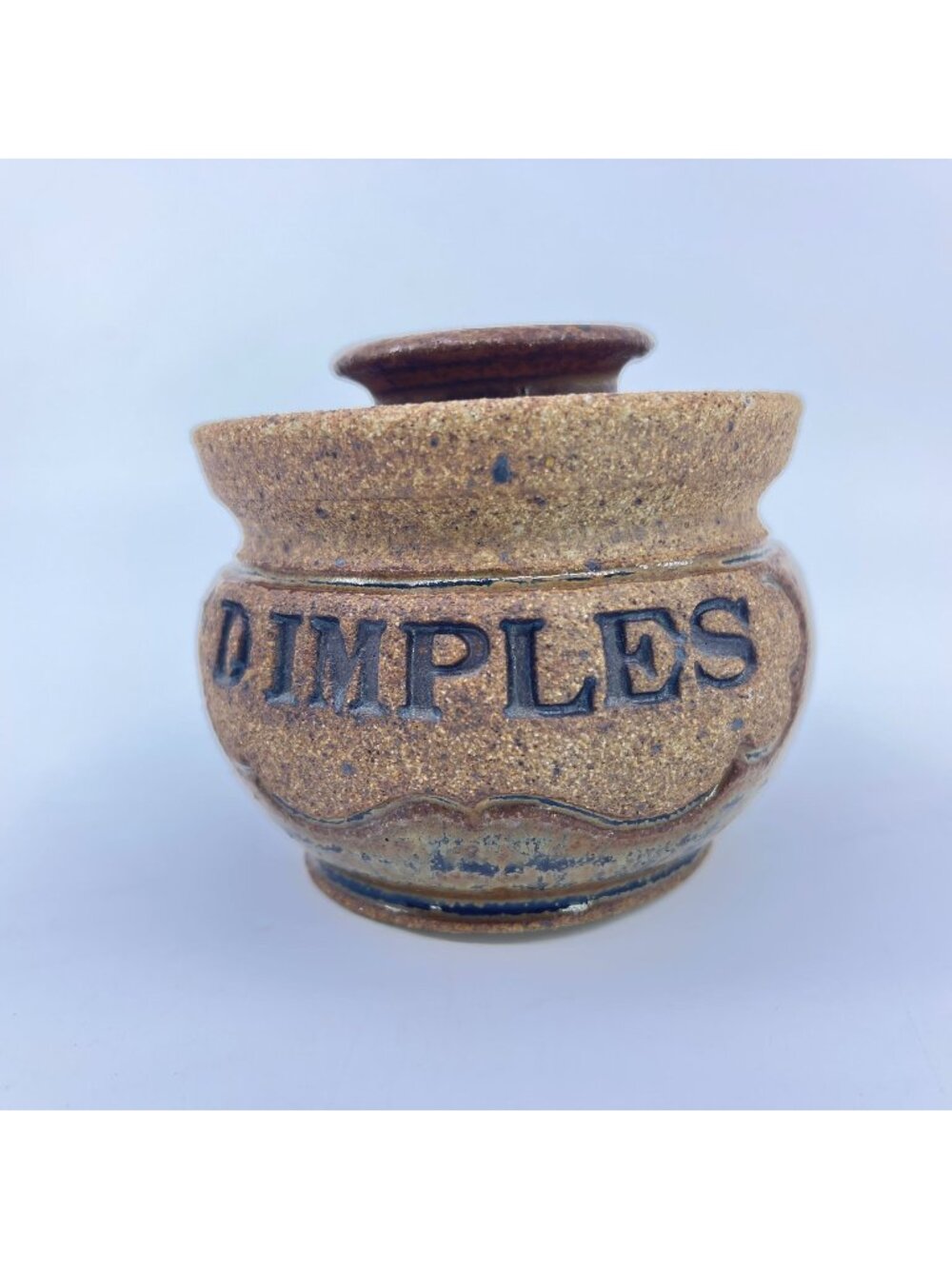 vintage handcrafted stoneware jar with lid "dimples" stamped textured brown